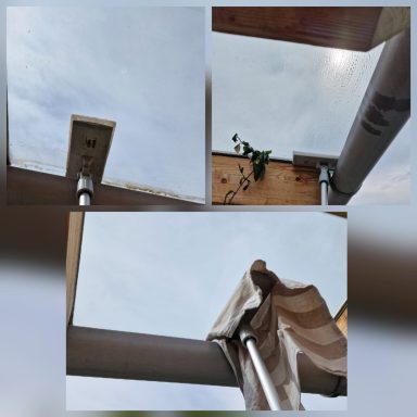 Randreinigung eines Glasdachs mit Ungerstange in Huglfing.